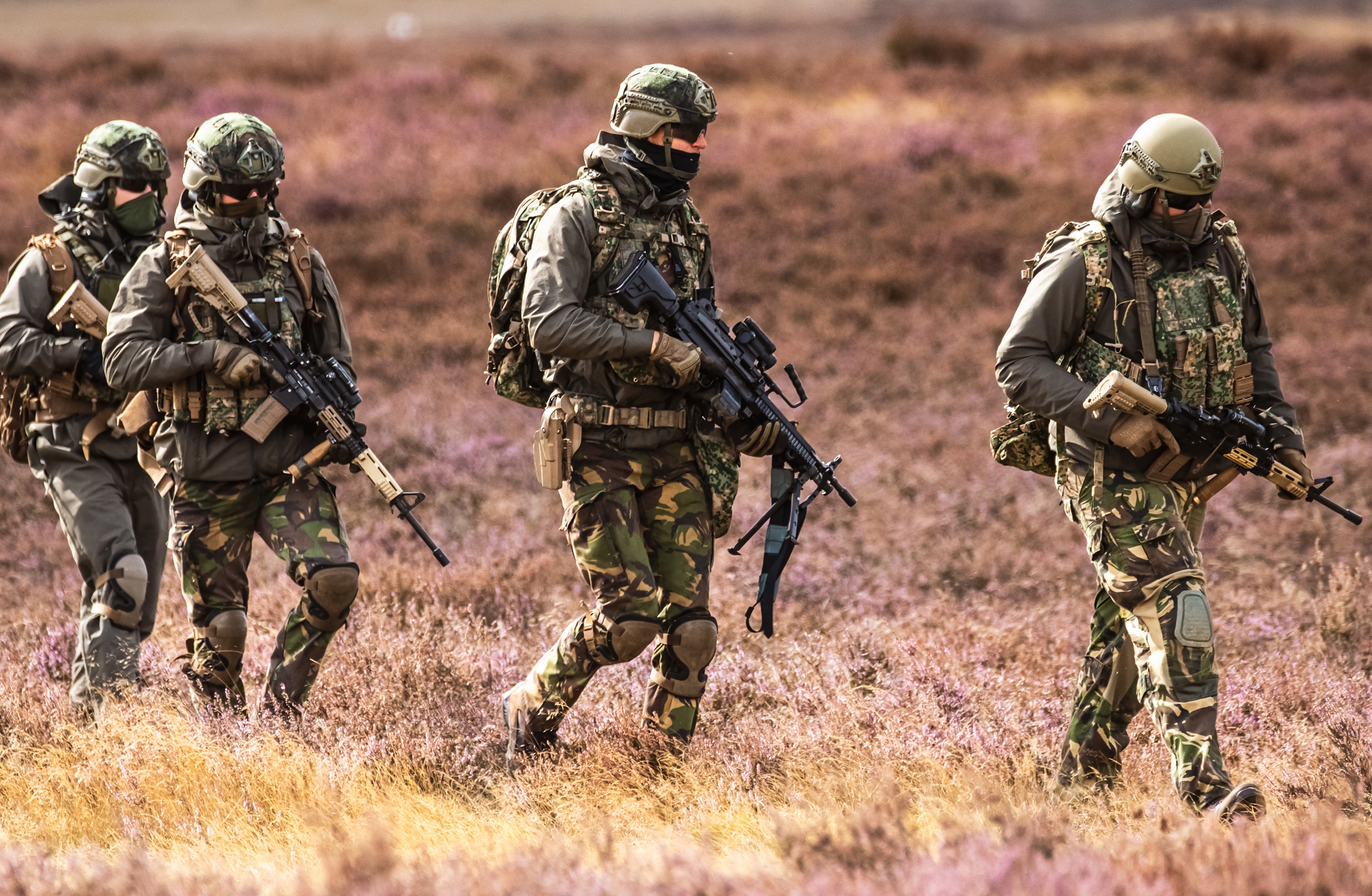 Dutch Ministry of Defence personnel reviewing SAP S/4HANA implementation on secure systems.