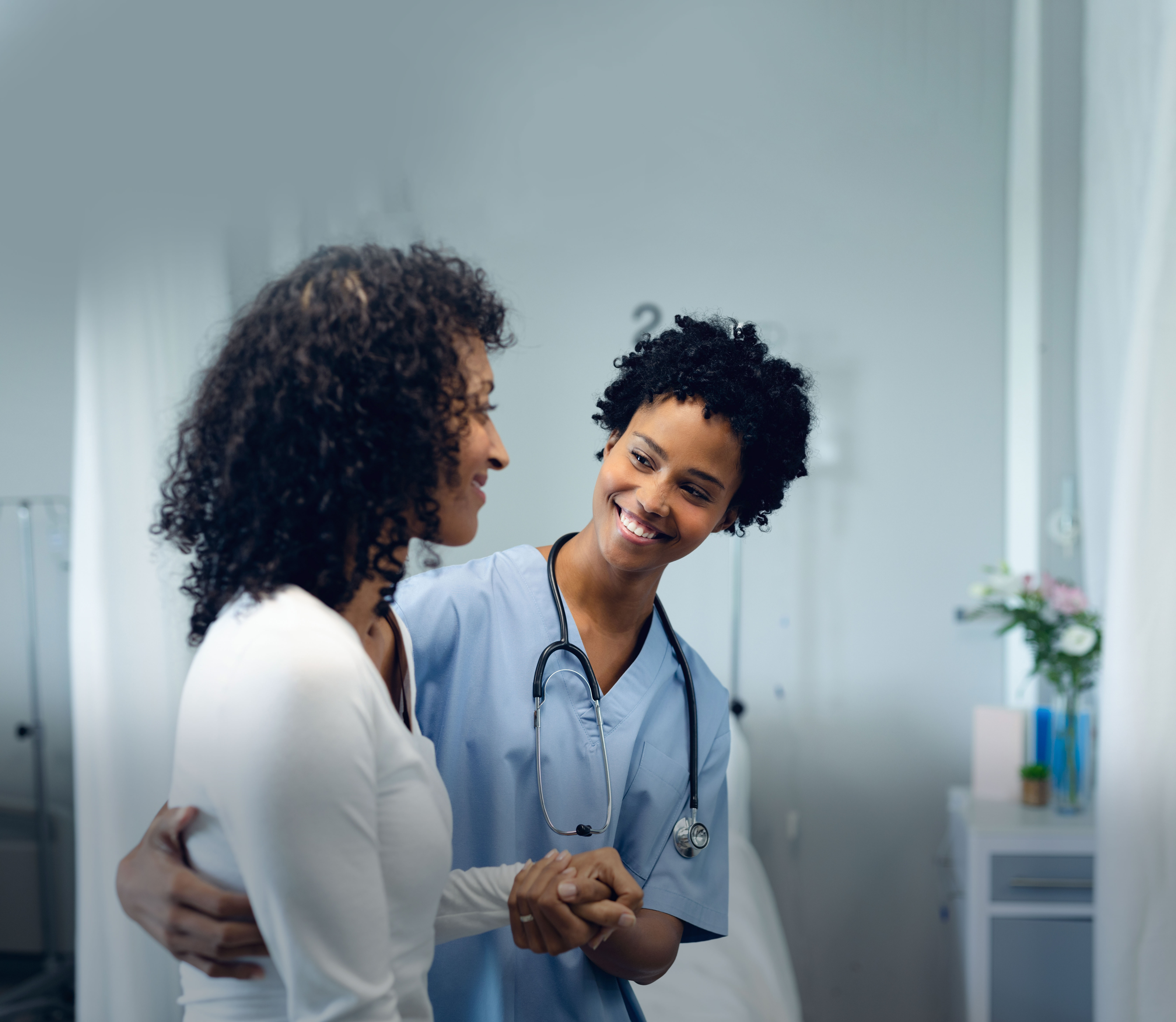 Healthcare IT professionals deploying Microsoft Azure cloud infrastructure in a hospital setting to improve patient outcomes and operational efficiency.