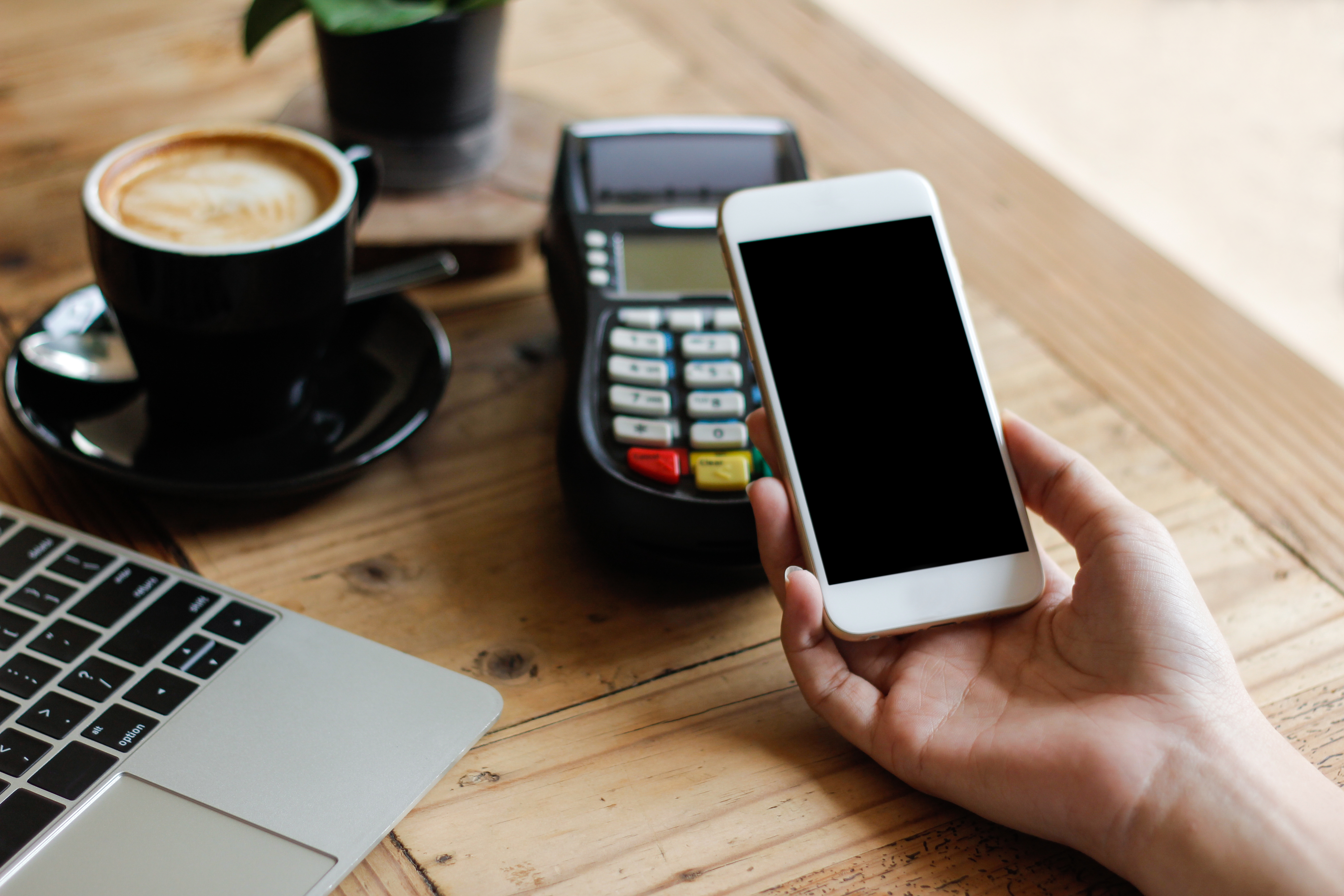 Blank,Phone,Payment,By,Nfc,Technology,In,Coffee,Shop