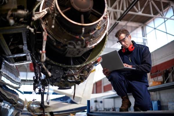 Aircraft mechanic in the hangar