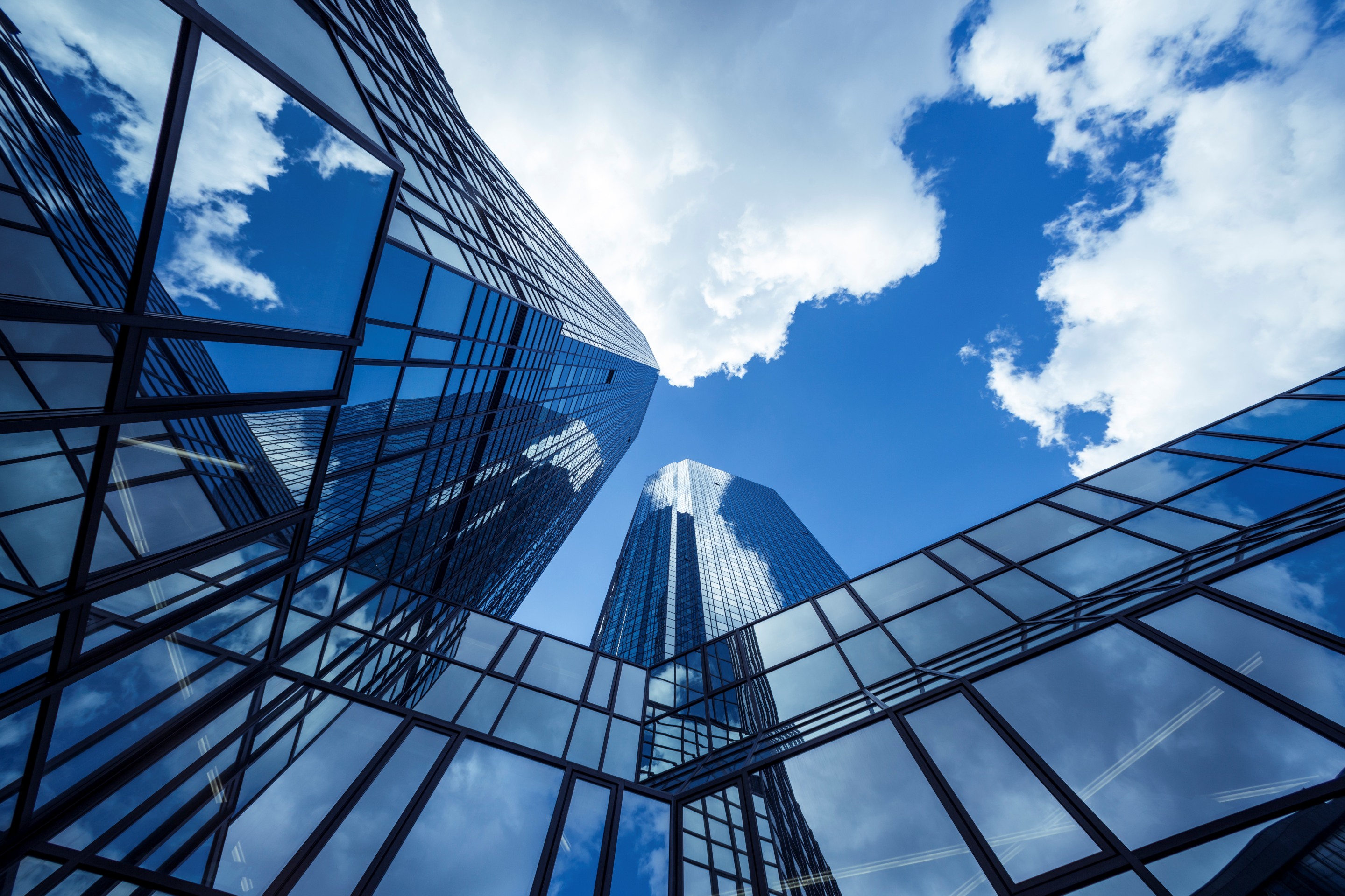 Clouds reflected in modern office buildings Frankfurt Germany